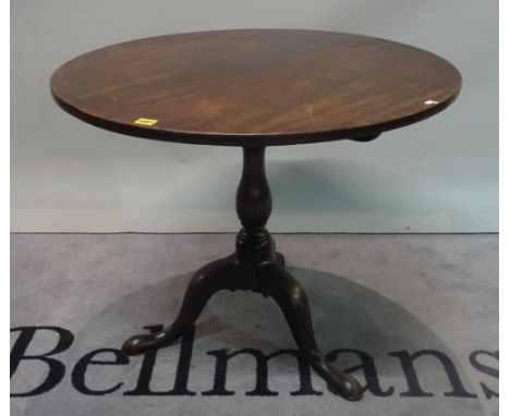 A George III mahogany circular tilt top tripod occasional table, 89cm wide x 70cm high.