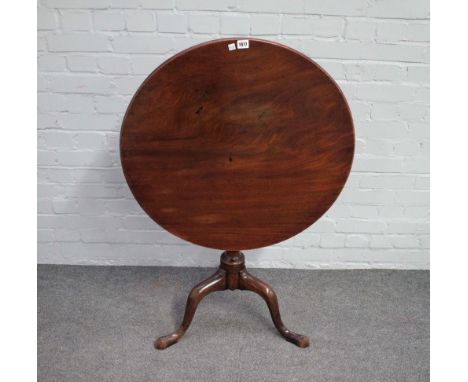 A mid-18th century mahogany circular snaptop occasional table on spiral fluted column on a tripod base, 74cm diameter x 73cm 