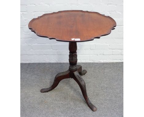 An 18th century Irish mahogany snap top piecrust occasional table on a tripod base, 68cm wide x 73cm high.