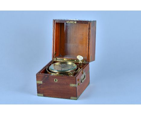 A brass-bound mahogany two-day marine chronometer Signed Christie & Wilson, Glasgow, Circa 1924 The three-tier box with bone 