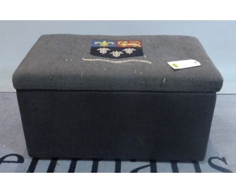 An early 20th century upholstered rectangular trunk, the needlework top with Eton College motto, 79cm wide x 45cm high. 