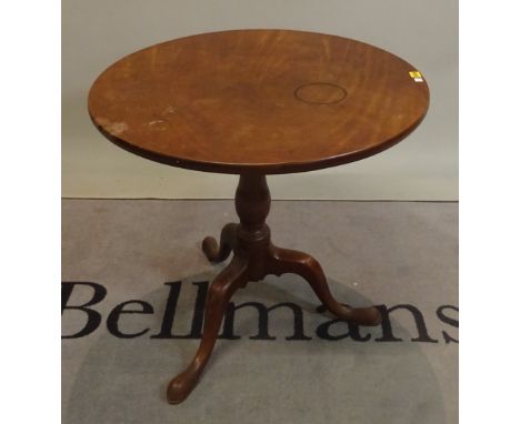 A George III and later mahogany tripod table with turned column on three downswept supports, 75cm dia, x 73cm high. 