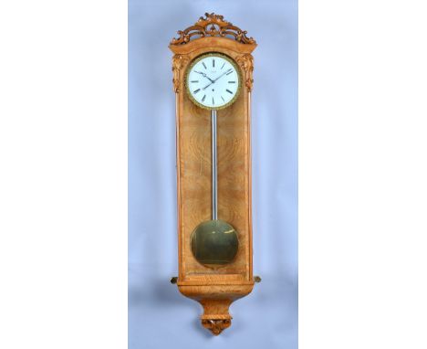 An ash Vienna regulatorBy C. Suchy, WienSecond half 19th Century, (1 pendulum and 1 key)The 6 1/4in enamel dial signed C. SUC