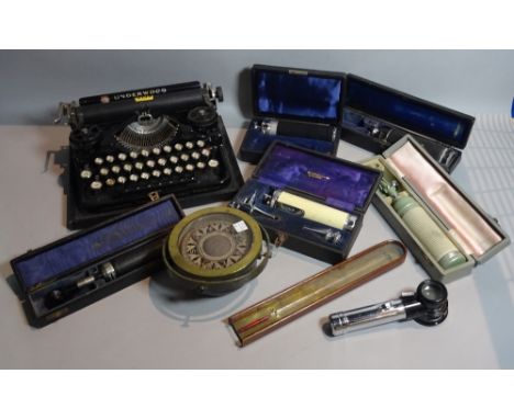 Collectables including an early 20th century portable typewriter, 30cm wide, a group of cased medical instruments, an early 2