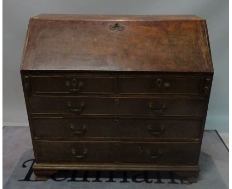 A mid-18th century mahogany bureau with fitted interior and ogee bracket feet, 112cm wide x 109cm high.