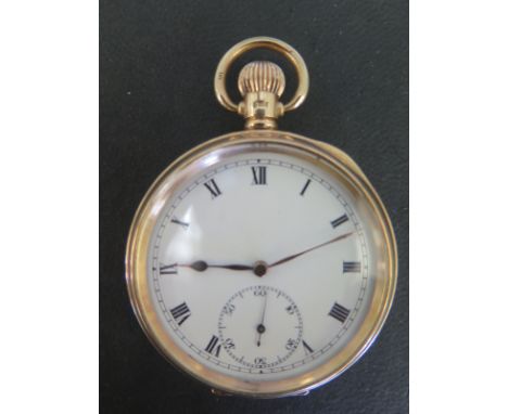 A 9ct gold cased top wind pocket watch 5cm wide - clean working order