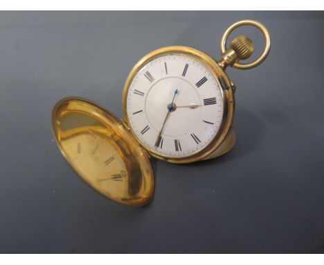 An 18ct top wind Hunter pocket watch having cream dial with split chapter ring displaying Roman numerals, minute and quarter 