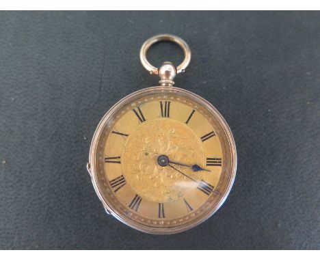 A 9ct gold ladies pocket watch with base metal back plate 3.5cm diameter - not working