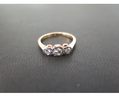 A diamond three-stone ring - Stamped 18ct and plat - Ring size M - Weight approx 2.8gms
Condition Report: Good 