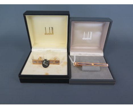 An Alfred Dunhill pair of BI metallic cufflink's and tie bar 
Condition report: In original boxes, as new condition, though b