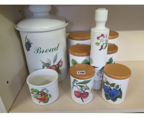 A collection of Pomona Portmeiron - six storage jars with lids, one cherry jar, a Bread  bin and a rolling pin
Condition repo