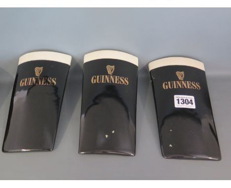 Three ceramic Guiness Plaques with bolt fixings at back