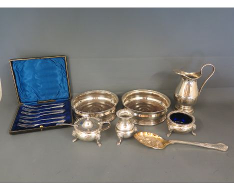 Silver plated ware comprising of cake forks, condiment set, a pair of bottle coasters, jug and berry spoon
Condition report: 