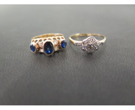 An 18ct gold sapphire and diamond dress ring - Hallmark obscured - Ring size G 1/2 - Together with a single-cut diamond clust