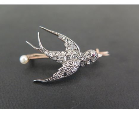 A diamond swallow brooch - The rose-cut diamonds to the ruby eye and seed pearl detail - Believed to be silver and gold - Wid