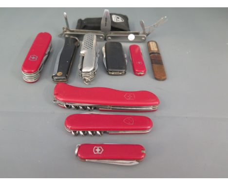 A selection of Swiss Army and other penknives - ten in total