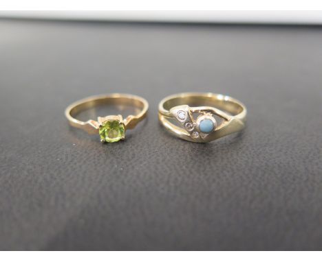 A blue-gem and diamond dress ring - Stamped 14kt - Ring size N 1/2 - Weight approx 2.9gms - Together with a peridot single-st
