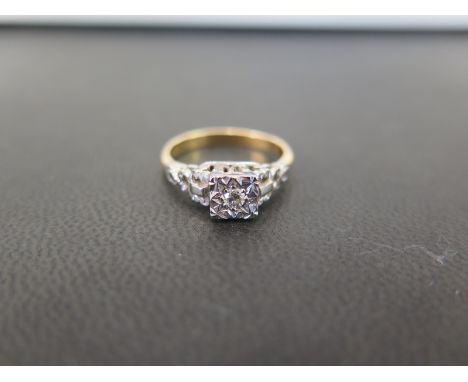 A diamond single-stone ring - The brilliant-cut diamond within a box setting - Stamped 18ct - Ring size M - Weight approx 3.3