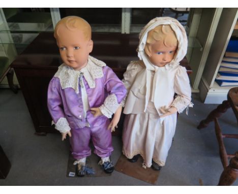 A pair of Edwardian Mannequins/shop display props - Height 85 cm  
Condition report: Worn condition throughout 