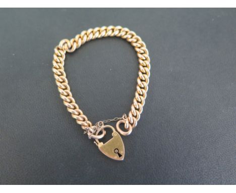 An early 20th century 15ct gold curb-link bracelet - Length 18cms - Weight approx 13.1gms
Condition Report: Good - With light