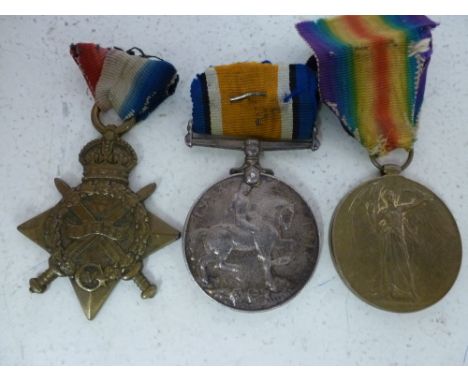 A World War One Trio of 1914-15 Mons Star, 1914-18 War Medal and Victory Medal awarded to S-17007 Pte W J Wolfe Army Service 