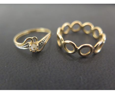 A cultured pearl ring - Stamped 750 (18ct) - Ring size M 1/2 - Weight approx 1.3gms - Together with an openwork full circle b