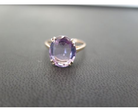 A 9ct gold amethyst single-stone ring - Hallmarked London - Ring size O - Weight approx 2.2gms
Condition Report: Good