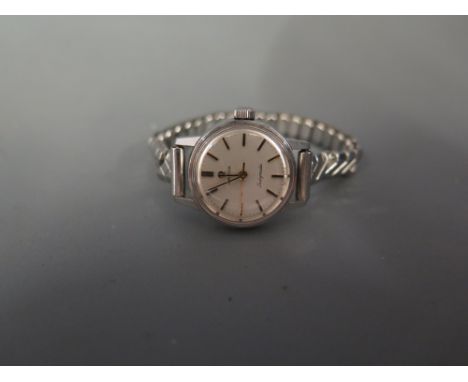 An Omega Ladymatic stainless steel wristwatch with metallic dial, having gilt applied hour markers and pencil hands upon conc