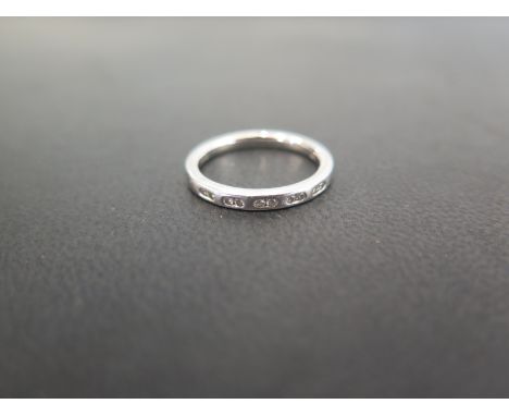 A platinum diamond-set band ring - Hallmarked Birmingham - Ring size L - Weight approx 3.9gms
Condition Report: Good - With l