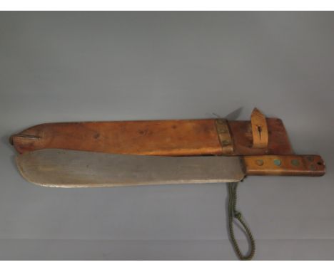 A World War II British Army issue machete and scabbard - Length 53 cm 