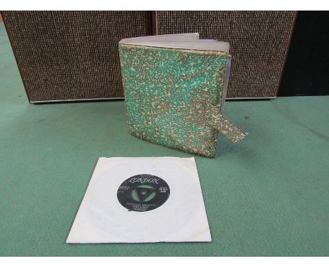 A vintage record folder containing a collection of 7" singles on the London label including Little Richard, Little Eva, Jerry