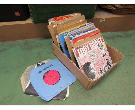 A box of assorted 7" singles including Donovan, Elvis Presley, Eddy Grant etc 