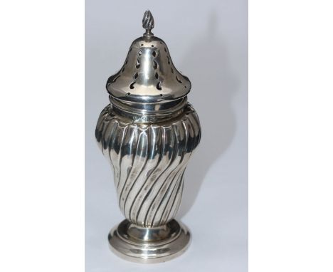 A late Victorian silver caster by Charles Westwood & Sons, with spiral-twisted body to splayed foot-rim, hallmarked Birmingha