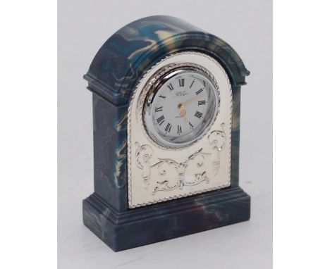 A small silver-mounted marbled-composite clock. 9cm high.