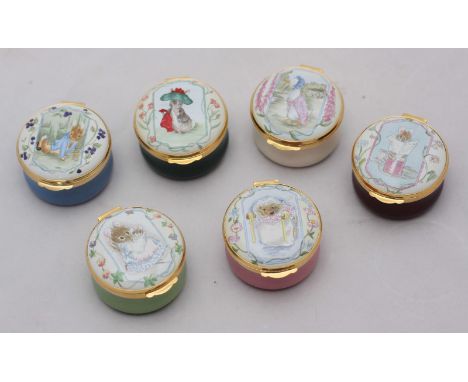 A set of six Crummles & Co circular enamel pill boxes including Peter Rabbit, Benjamin, Jemima Puddleduck, Mrs Tiggywinkle et