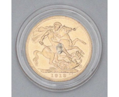 A 1913 gold sovereign, in clear plastic capsule, (silver solder mark to leg of St George on reverse)