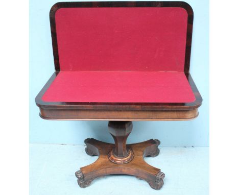 A William IV rosewood folding card table, the hinged top opening to reveal a burgundy playing baize and raised on an inverted