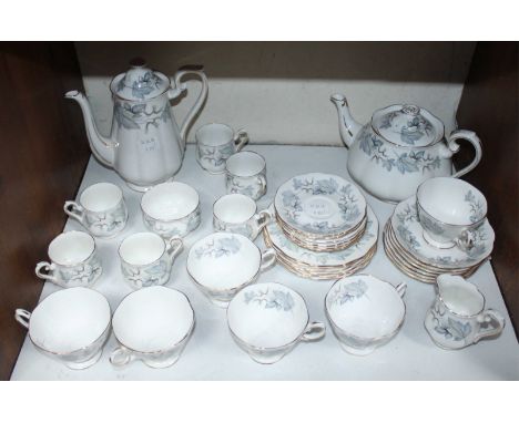 SECTION 16.  A 34-piece Royal Albert 'Silver Maple' pattern part tea and coffee set, comprising of cups, coffee cans, saucers