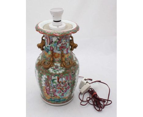 A Chinese Canton porcelain vase, converted to a lamp and decorated in polychrome enamels, with scenes of figures, birds and b