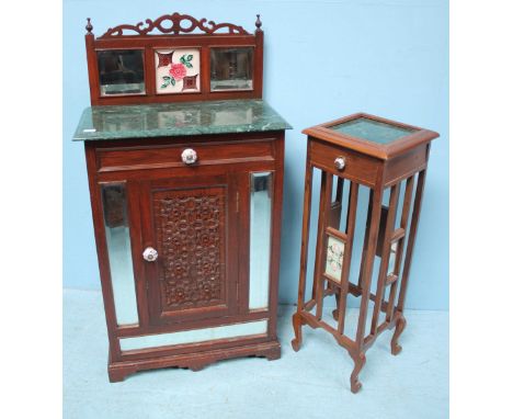 A Victorian mahogany music cabinet, the pierced, raised back with central floral panel, flanked by mirrors, to a green marble