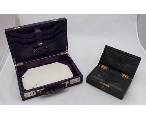 A Victorian black money box, the top opening to reveal a compartmented interior with sections for notes, gold and silver, wit