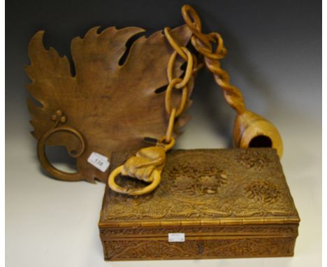 An Anglo -  Indian sandalwood  carved box; an olive wood carved platter in the form of a vine leaf; an olive wood carved air 