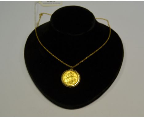 A Victorian sovereign, 1901, mounted, 9ct gold chain, 12.6g