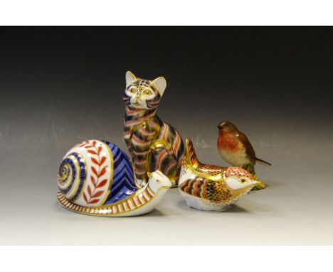 A Royal Crown Derby Garden Snail, ceramic stopper; a Royal Crown Derby seated Tabby, ceramic stopper; a Royal Crown Derby Wre