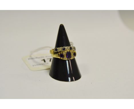 A three stone amethyst and diamond chip ring, 9ct gold shank;  another, nine stone sapphire and diamond chip, 9ct gold shank 