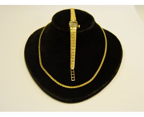 A lady's 9ct gold Rotary wristwatch; a 9ct gold chain , 7g