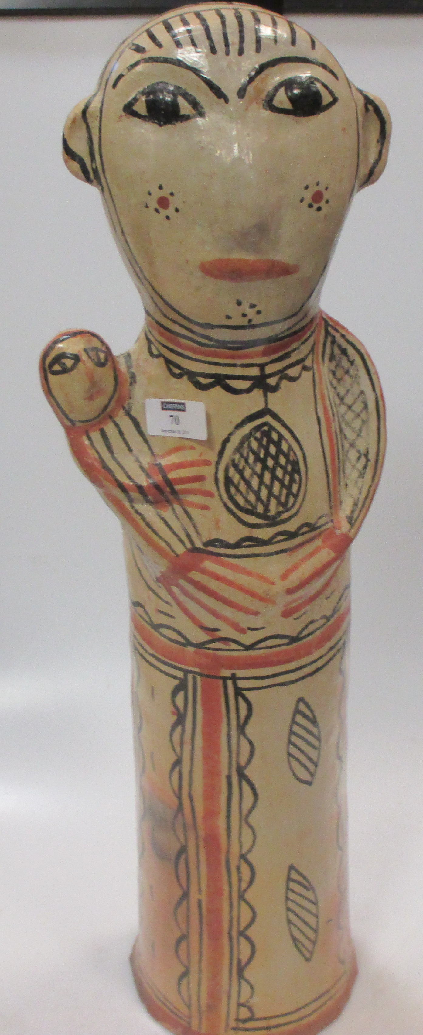 Folk art pottery figure of a woman, 59 cm high in Cheffins Fine Art