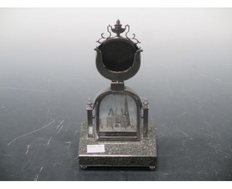 A mid 19th century Russian pocket watch stand, pierced and damascened steel featuring a gauche portrait of St Stephens Vienna