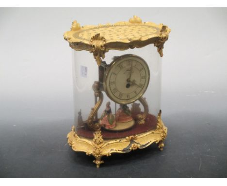 A burrwood mantal timepiece with French drum movement; two cuckoo clocks; a Geman anniversary clock &amp; various Pathescope 
