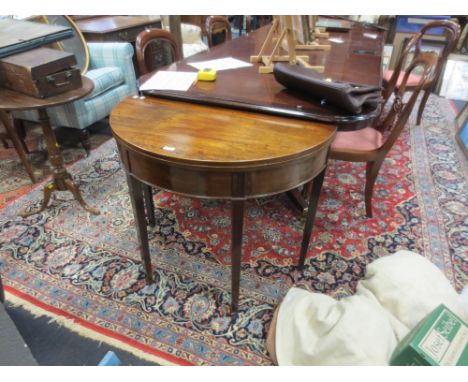 A George III mahogany demi-lune card table, with beize lined interior, 88cm x 72cm  